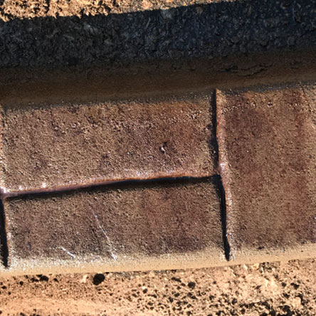 H Brick patterned curbing